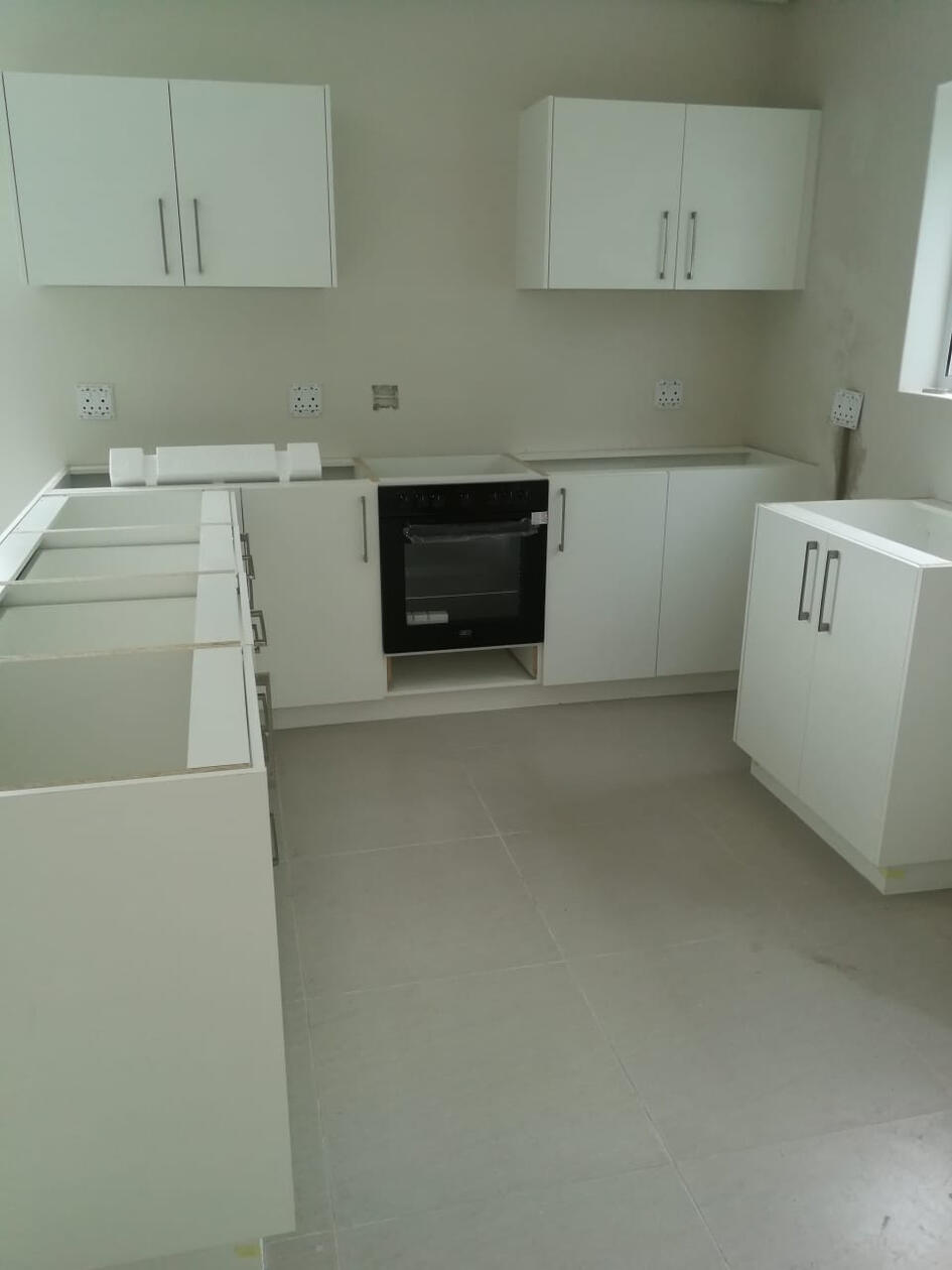 Kitchen This installation is shown without countertops. Our joinery can support both lightweight options or be reinforced to accommodate heavier materials like marble or engineered quartz.
